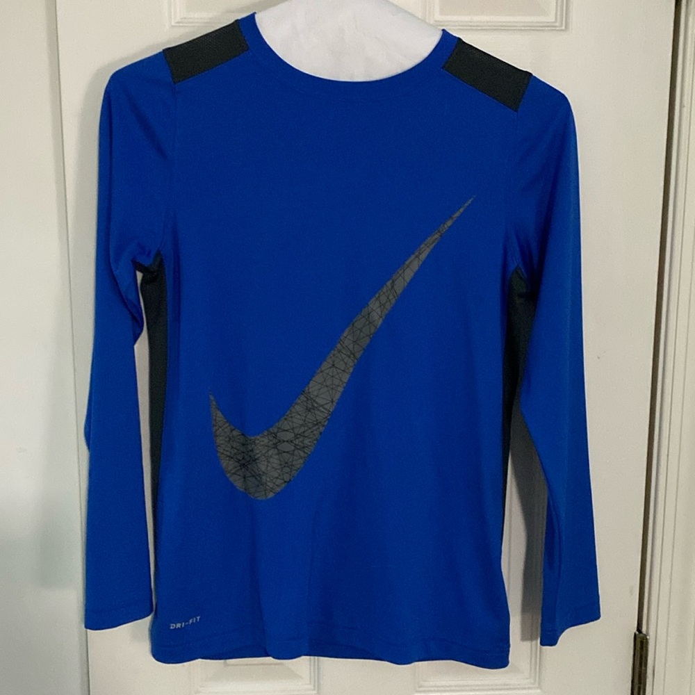 Nike blue dri-fit athletic shirt with gray swoosh
